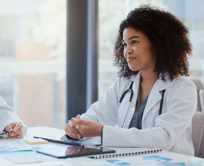 Woman Doctor Working on healthcare finance platform